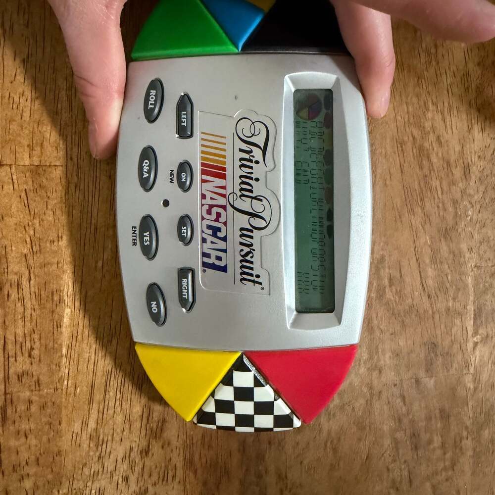 HASBRO ELECTRONIC HANDHELD TRIVIAL PURSUIT NASCAR CAR RACING FACT FAMILY GAME
